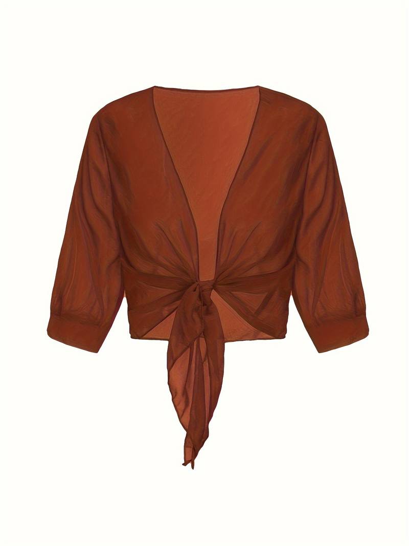 "Luchtige elegante damesblouse met open voorkant, frisse charmante look, perfect voor zonnige dagen."