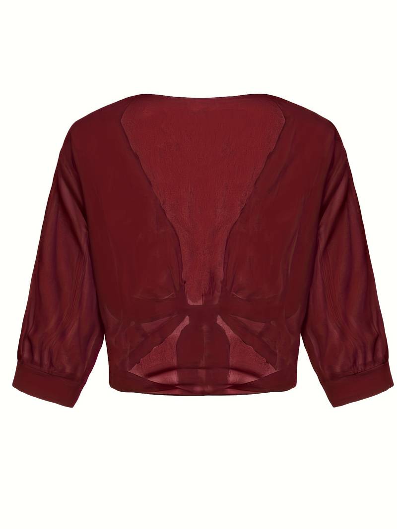 "Luchtige elegante damesblouse met open voorkant, frisse charmante look, perfect voor zonnige dagen."