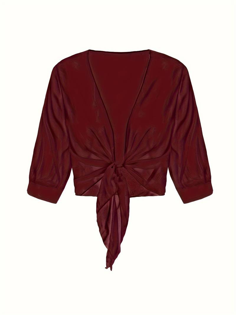 "Luchtige elegante damesblouse met open voorkant, frisse charmante look, perfect voor zonnige dagen."