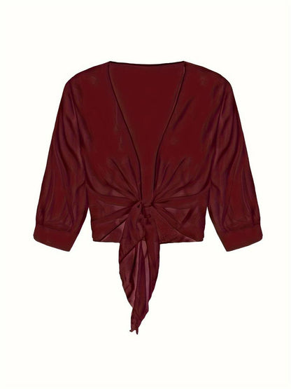 "Luchtige elegante damesblouse met open voorkant, frisse charmante look, perfect voor zonnige dagen."