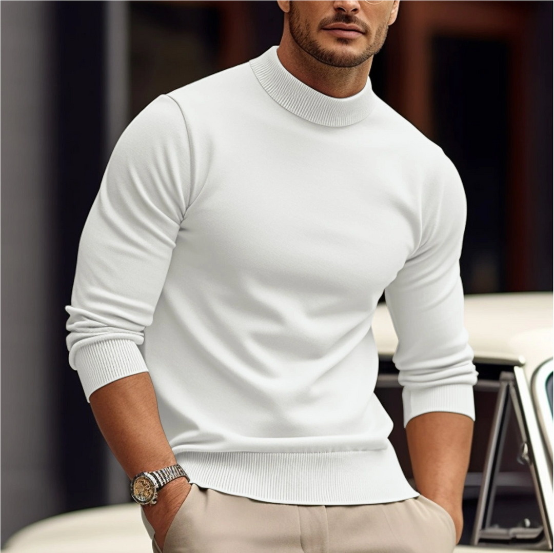 Heren slim-fit coltrui in zwart, ideaal voor een elegante winterlook. Comfortabele en moderne herenmode.