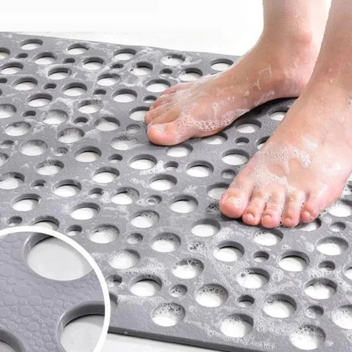 Roze antislip douchemat van zacht, duurzaam materiaal. Biedt comfort en veiligheid in de badkamer.