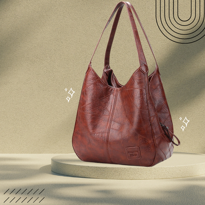 "Luxe leren schoudertas voor vrouwen, elegant design, duurzaam echt leer, ruim met georganiseerde vakken."