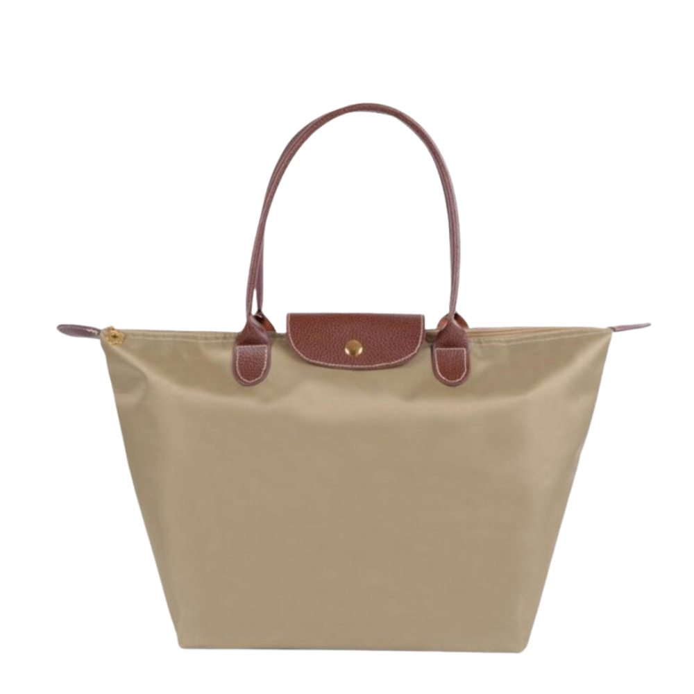 Grote stijlvolle dames tas van duurzaam nylon en leer. Ruime en waterafstotende draagtas voor elke gelegenheid.