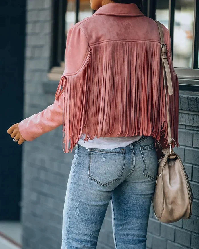 Opvallend roze damesjasje met franjes, een trendy en modieuze look.