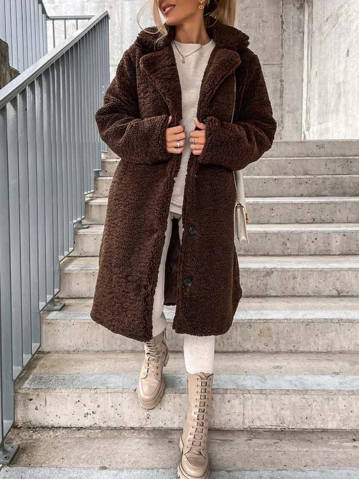 Winterkleding: lange teddyjas voor dames, comfortabel en modieus, een must-have winterjas.