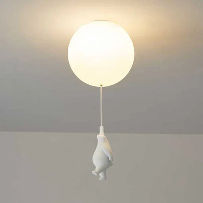 "Magische kinderlamp met speelse beer en ballon, warme LED-verlichting, ideaal voor kinderkamer, sfeervol design."
