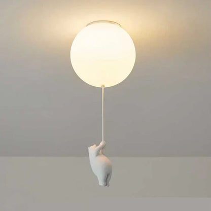 "Magische kinderlamp met speelse beer en ballon, warme LED-verlichting, ideaal voor kinderkamer, sfeervol design."