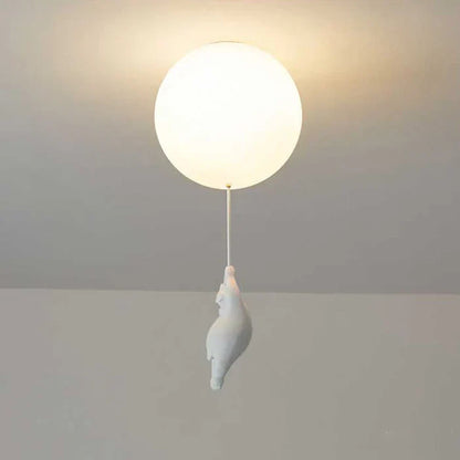 "Magische kinderlamp met speelse beer en ballon, warme LED-verlichting, ideaal voor kinderkamer, sfeervol design."