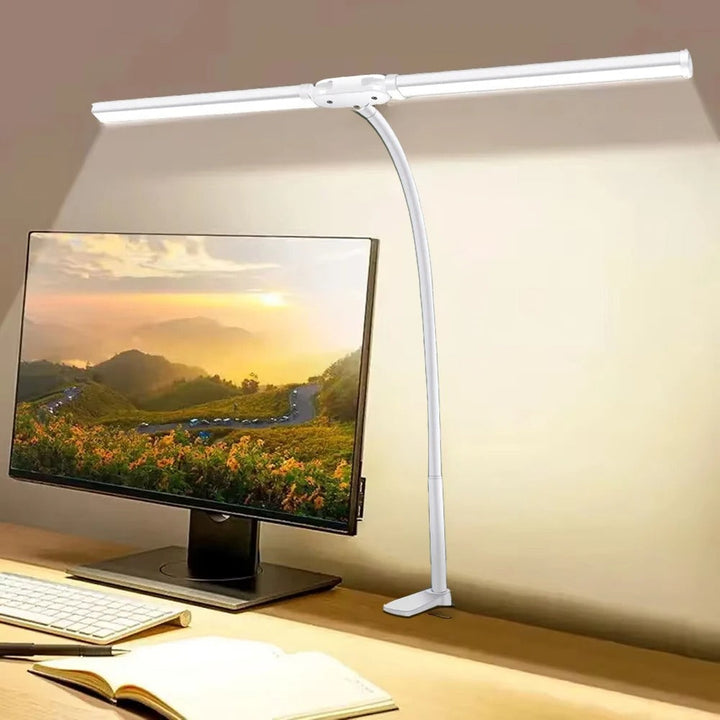 Moderne dubbele LED bureaulamp met flexibele armen; ideaal voor werkplek of studeerkamer. Dimbare verlichting.
