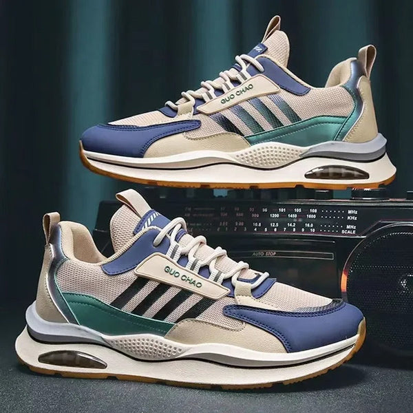 Stijlvolle heren retro sneakers in beige, oranje en groen met comfortabele pasvorm en vetersluiting.