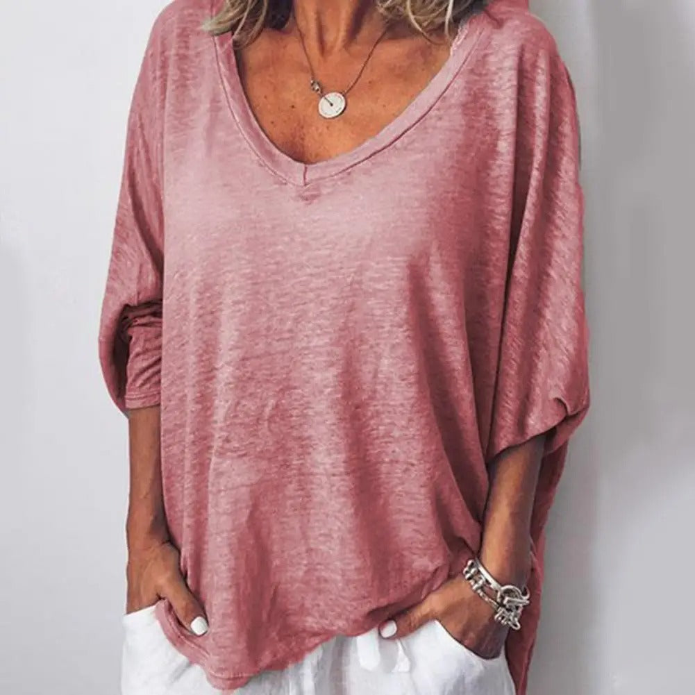 Muller dames blouse met V-hals, losse pasvorm en korte mouwen, ideaal voor zomer. Comfortabel en modieus.