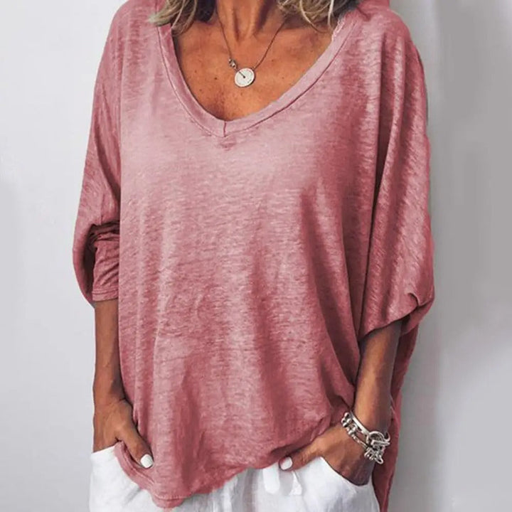 Muller dames blouse met V-hals, losse pasvorm en korte mouwen, ideaal voor zomer. Comfortabel en modieus.