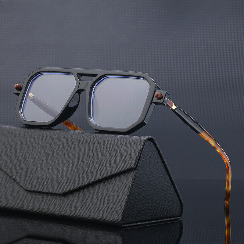 Unisex vierkante zonnebril met blauw licht filter. Stijlvol retro design voor optimale oogbescherming.
