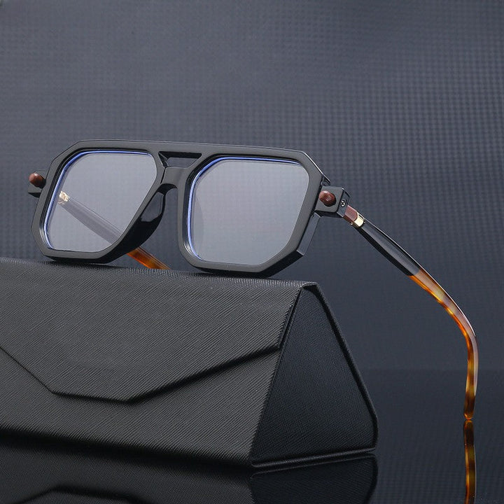 Unisex vierkante zonnebril met blauw licht filter. Stijlvol retro design voor optimale oogbescherming.