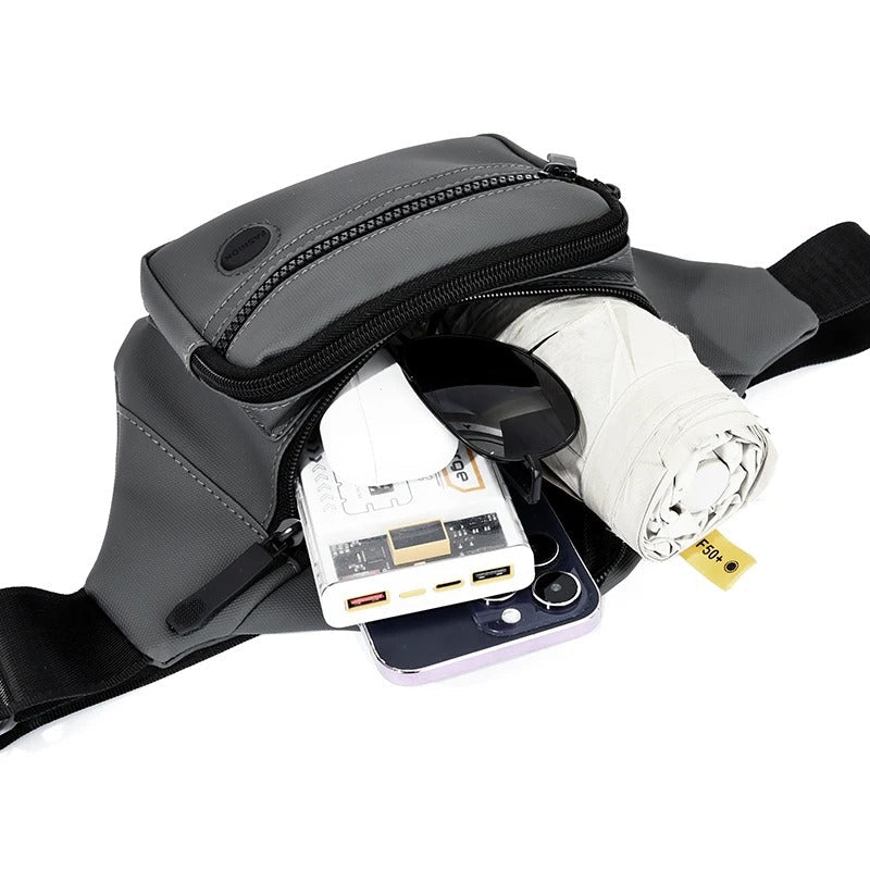 Blauwe compacte heren crossbody heuptas, waterdicht en multifunctioneel voor reizen.