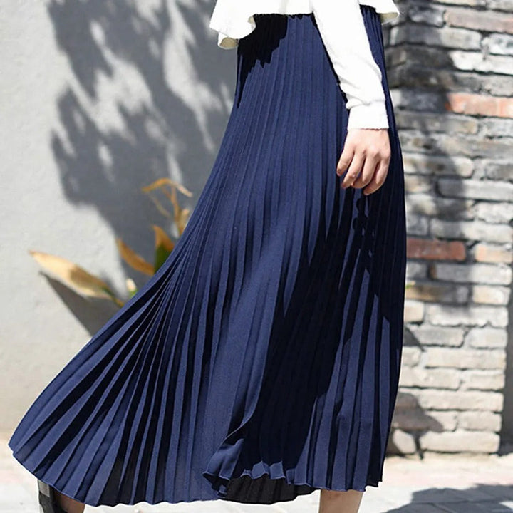 Modieuze zwarte plooirok midi voor dames, ideaal voor een chique look of casual outfit, alle seizoenen.