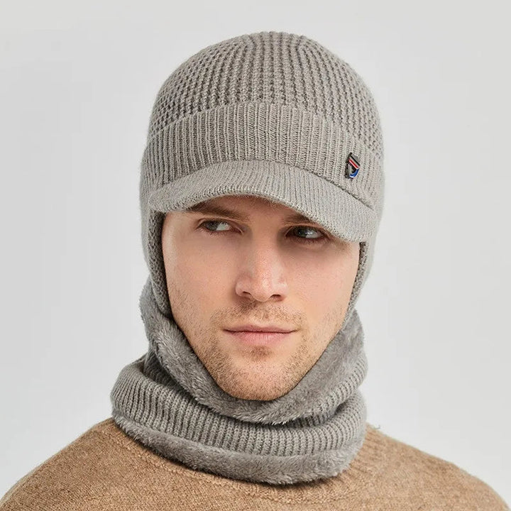 Heren gebreide wintermuts met klep. Warm, stijlvol en comfortabel voor koude dagen.