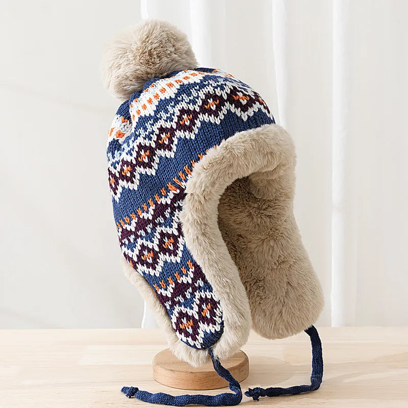 Unisex pilotenmuts met warme voering, perfect voor winterse dagen. Stijlvol en comfortabel hoofddeksel.