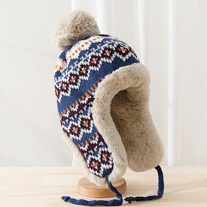 Unisex pilotenmuts met warme voering, perfect voor winterse dagen. Stijlvol en comfortabel hoofddeksel.