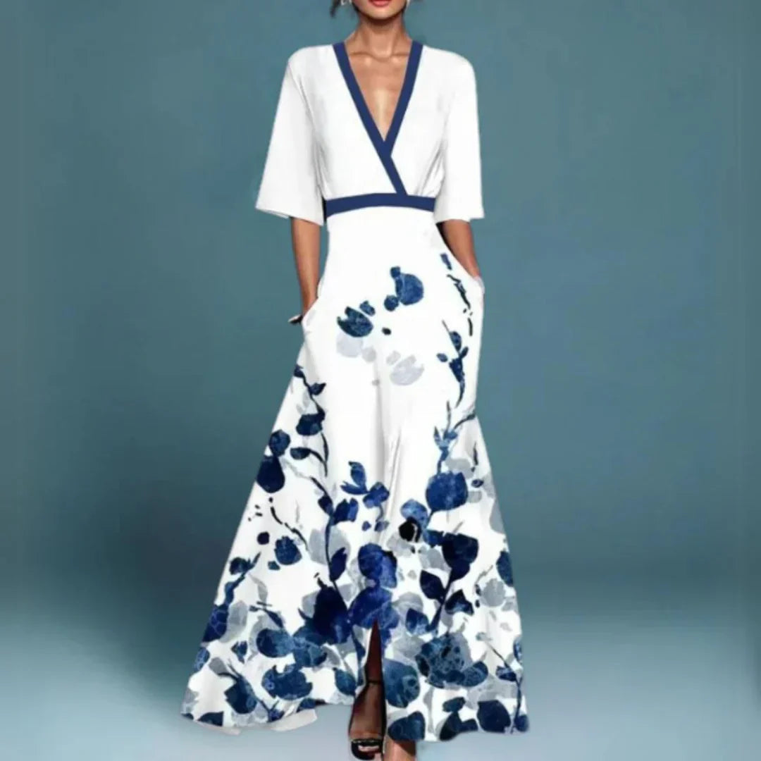 Casual dames maxi jurk met levendige bloemenprint, comfortabele A-lijn pasvorm en flatterende V-hals.
