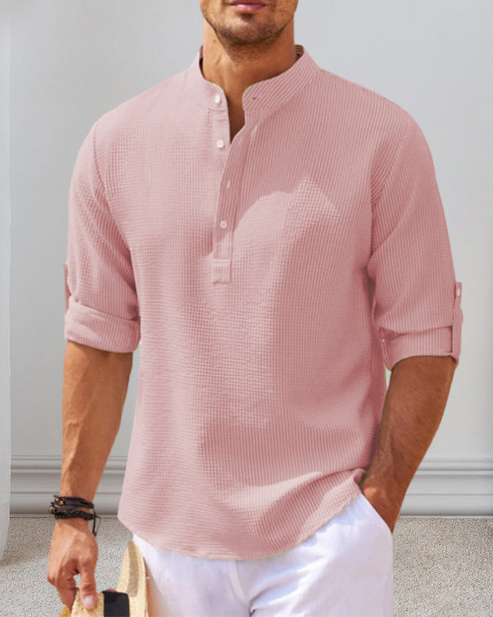 Roze heren casual Henley overhemd met opstaande kraag en lange mouwen. Ideaal voor lente en zomer.