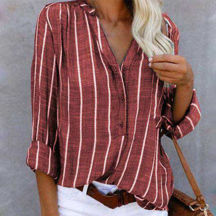 Chique gestreepte damesblouse met stijlvolle V-hals en lange mouwen, perfect voor elke gelegenheid.