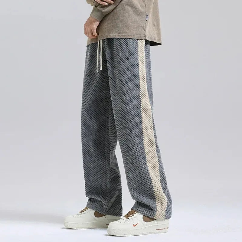 Casual herenbroek met trekkoord, wijde pijpen en trendy zijstreep, ultiem comfort en stijl.