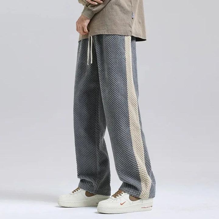 Casual herenbroek met trekkoord, wijde pijpen en trendy zijstreep, ultiem comfort en stijl.