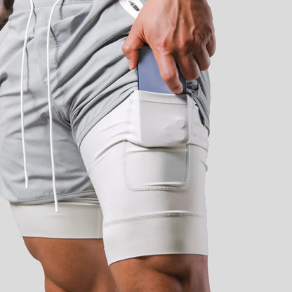 "Mauro 2-in-1 sportbroek heren, zwart, shorts met ingebouwde compressielegging, functionele zakken, elastische tailleband."