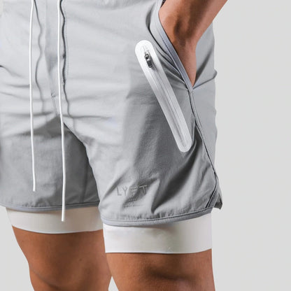 "Mauro 2-in-1 sportbroek heren, zwart, shorts met ingebouwde compressielegging, functionele zakken, elastische tailleband."