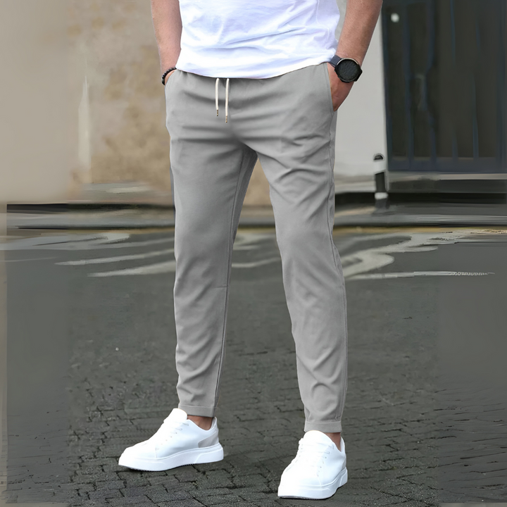 Moderne slim fit herenbroek met trekkoord, comfortabele dagelijkse broek voor een actieve levensstijl.