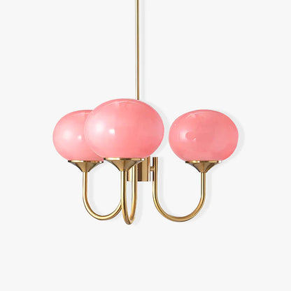 "Moderne kroonluchter met gouden afwerking en roze glazen kappen, geschikt voor LED verlichting in eigentijds interieur."