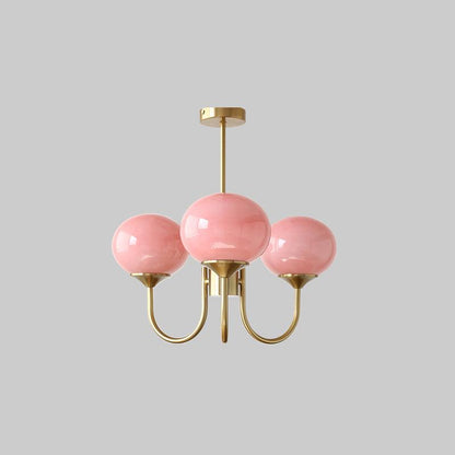 "Moderne kroonluchter met gouden afwerking en roze glazen kappen, geschikt voor LED verlichting in eigentijds interieur."