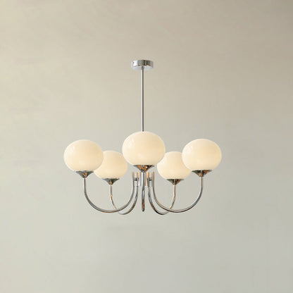 "Moderne kroonluchter met gouden afwerking en roze glazen kappen, geschikt voor LED verlichting in eigentijds interieur."