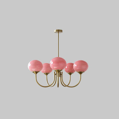 "Moderne kroonluchter met gouden afwerking en roze glazen kappen, geschikt voor LED verlichting in eigentijds interieur."