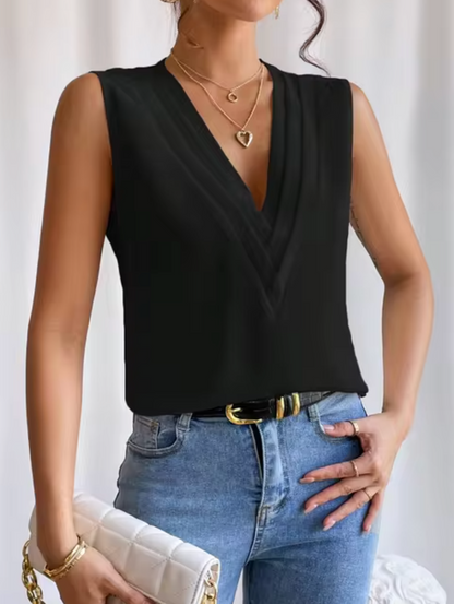"Mouwloze dames V-hals top, elegant en luchtig, in zachte stof, ideaal voor casual en chique gelegenheden."