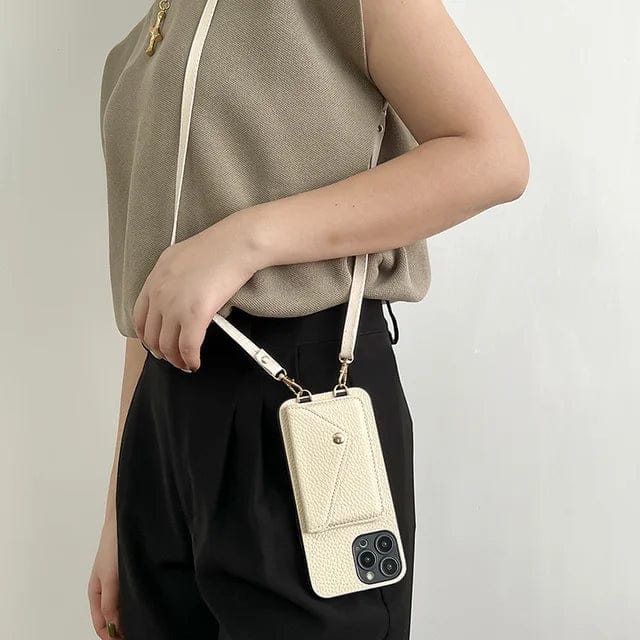 Detail van de geïntegreerde pasjeshouder in het lederen crossbody telefoonhoesje, geschikt voor iPhone.
