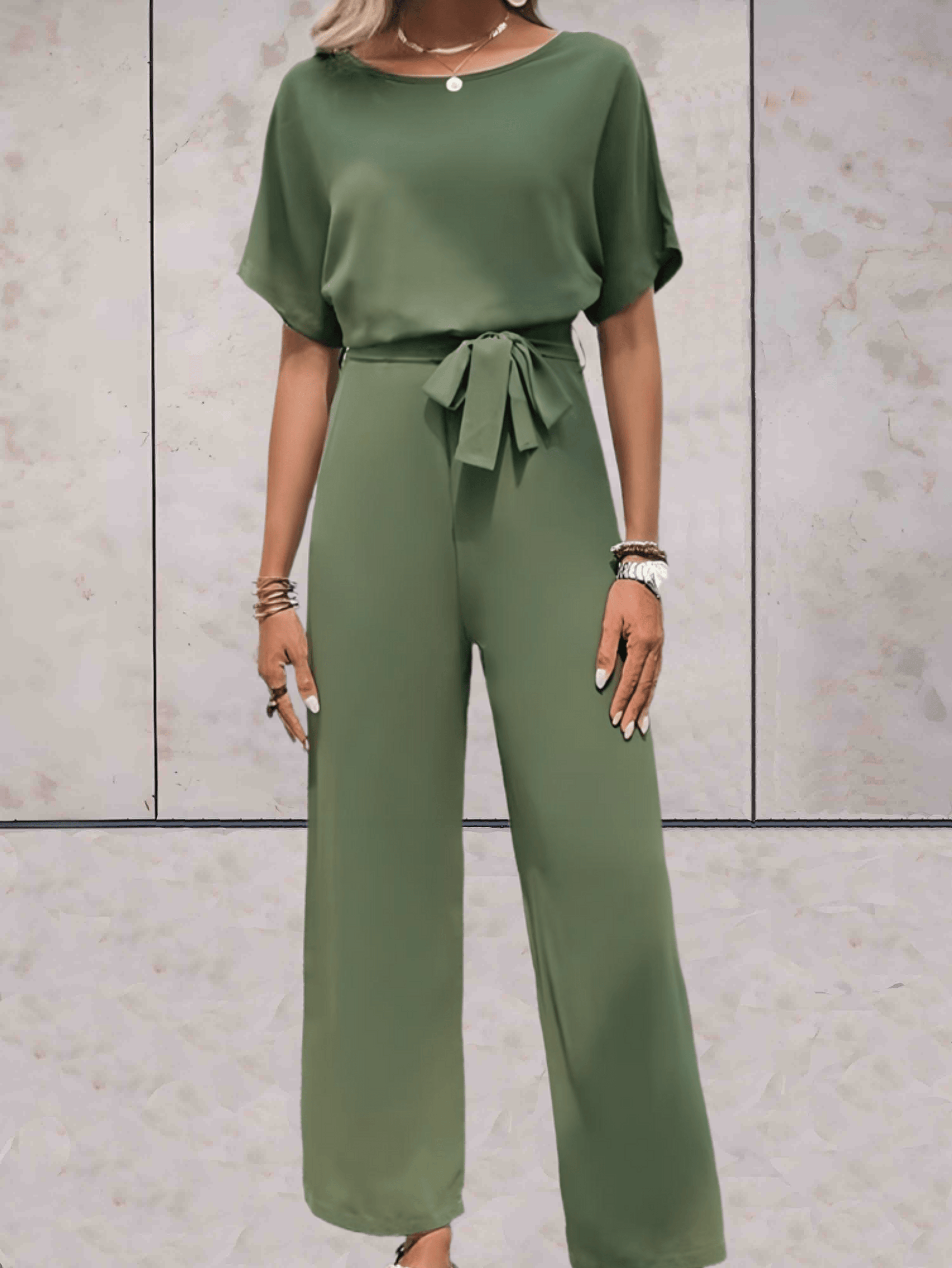 "Noa jumpsuit dames, stijlvol en comfortabel, wijde mouwen, striklinten, ademende stof, chic en veelzijdig."