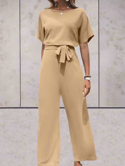 "Noa jumpsuit dames, stijlvol en comfortabel, wijde mouwen, striklinten, ademende stof, chic en veelzijdig."