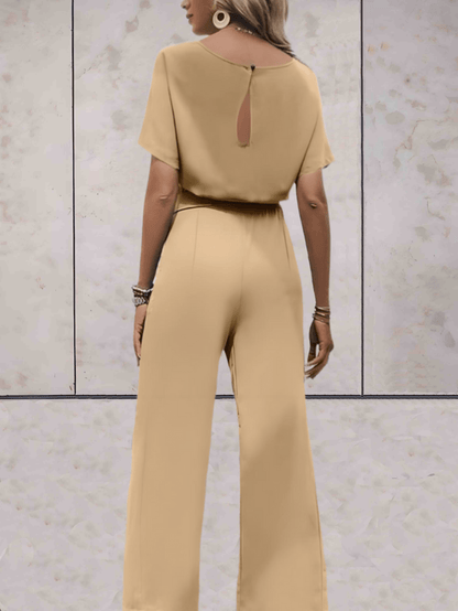 "Noa jumpsuit dames, stijlvol en comfortabel, wijde mouwen, striklinten, ademende stof, chic en veelzijdig."
