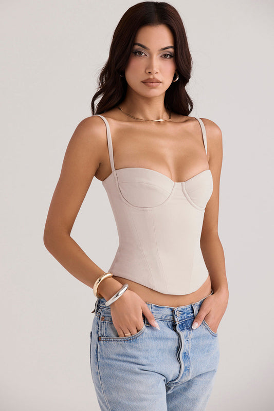 Oesterkleurig korset met beugeldesign, voorgevormde beugels en verstelbare bandjes, elegante en minimalistische look.