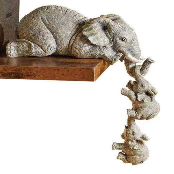 Handgemaakt decoratief olifanten beeldje van resin, symboliseert moedersliefde, perfect als woondecoratie ornament.