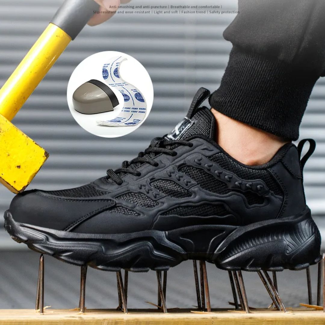 "Onverwoestbare zwarte werksneakers met stalen neus, anti-plet, flexibele zool, ideaal voor bescherming en comfort."
