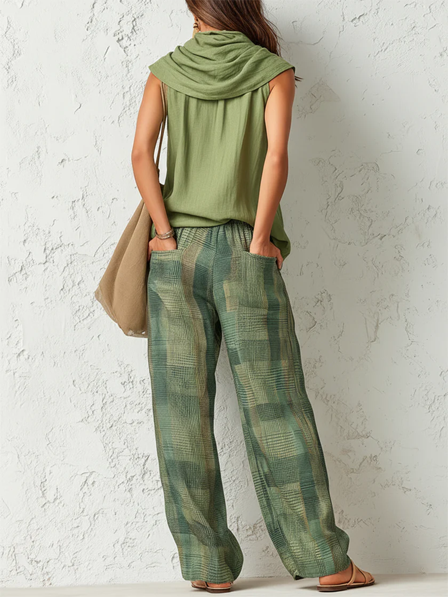 Elegant groen dames pak (tweedelig) met blouse en wijde broek. Natuurlijke stijl, comfortabel en zomers.