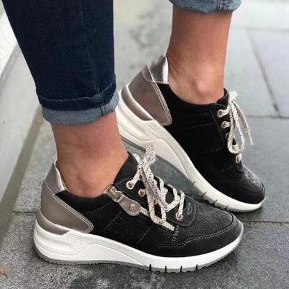 "Orthopedische dameswandelschoenen met veters, brede teenbox en anatomische steun voor comfort en dagelijkse wandelingen."