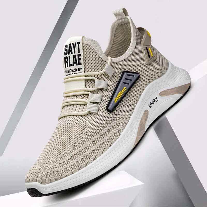"Orthopedische heren sportschoenen in beige en zwart, met ademend honingraat ontwerp voor comfort en stabiliteit."