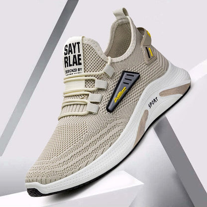 "Orthopedische heren sportschoenen in beige en zwart, met ademend honingraat ontwerp voor comfort en stabiliteit."