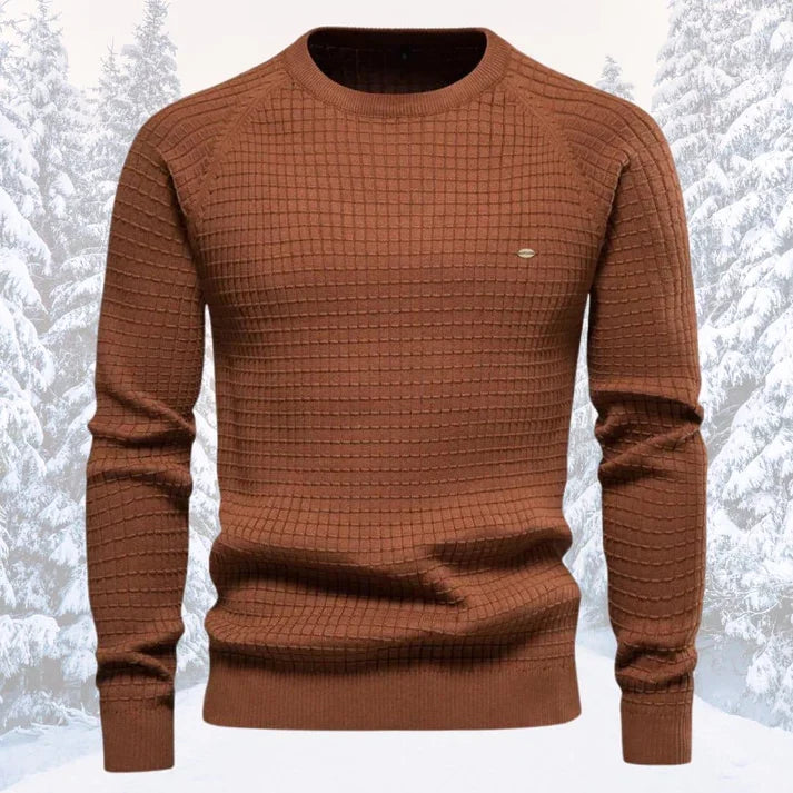 Veelzijdige heren trui, gebreid en warm, combineert stijl met comfort voor casual en modebewuste looks.