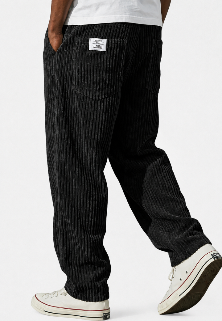 Losse herensweatbroek met rechte pijpen en elastische tailleband. Comfortabele, modieuze herenkleding voor een relaxte dag.